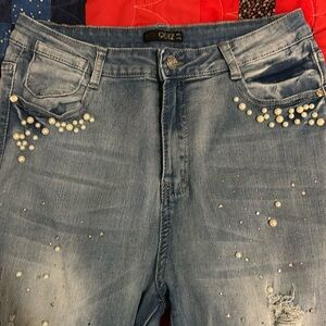Embellished and distressed jeans